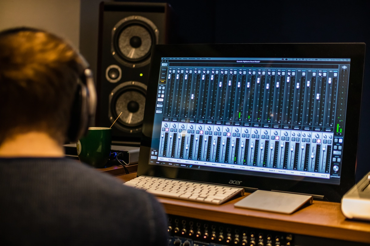 Man infront of a sound panel